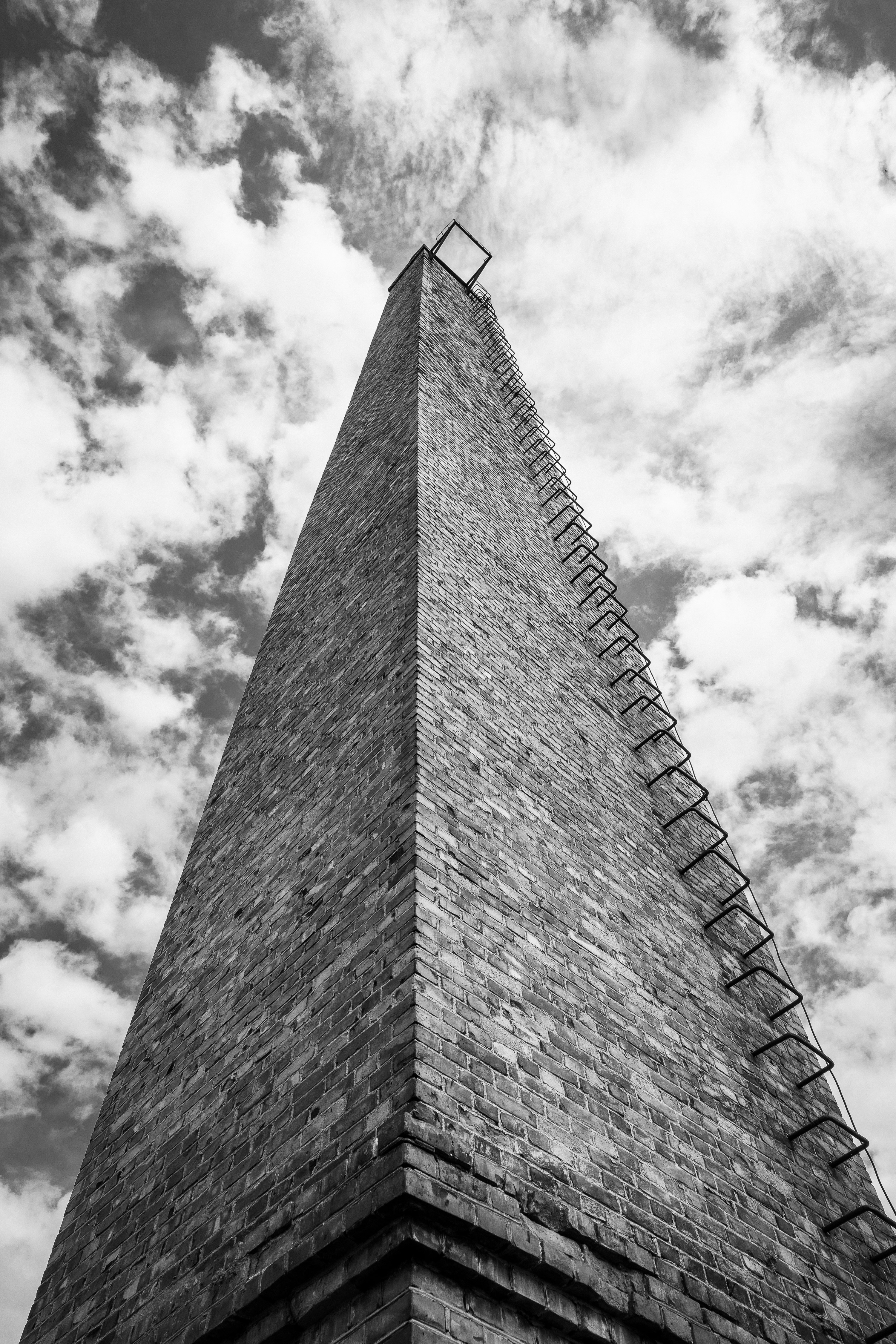 grayscale photo of concrete building